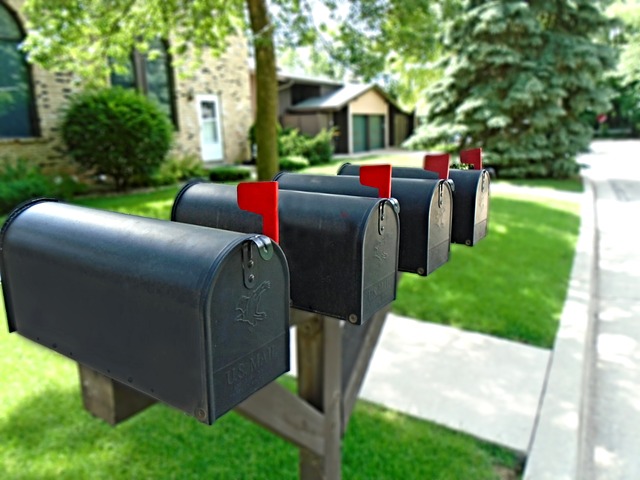 mailboxes aligned in the front yard